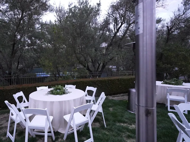 Buffet line set with chafing dishes for a Pacifica beachfront reception