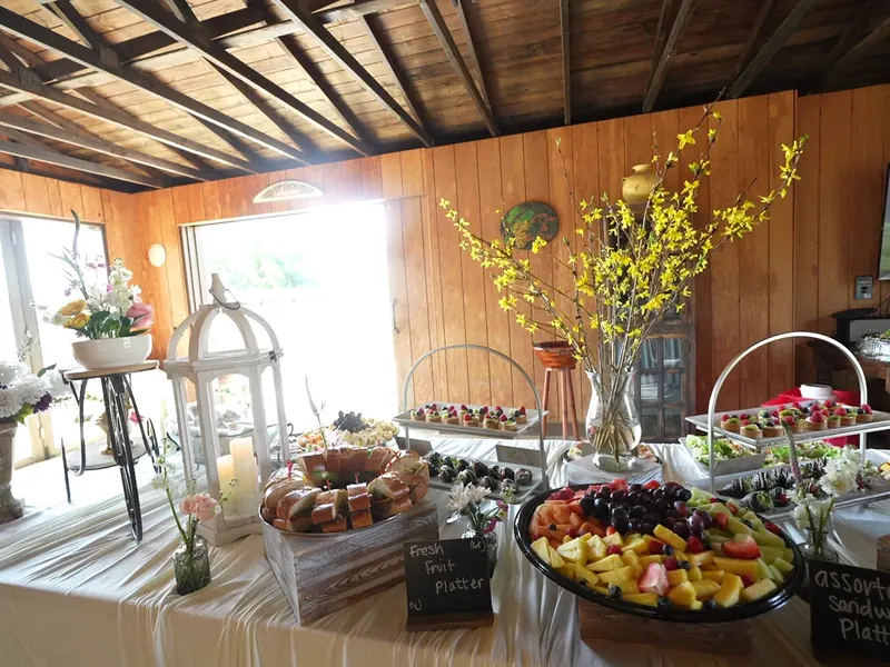 Drop-off dinner trays arranged on a kitchen counter for a small group