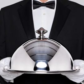 A food server in redwood catering